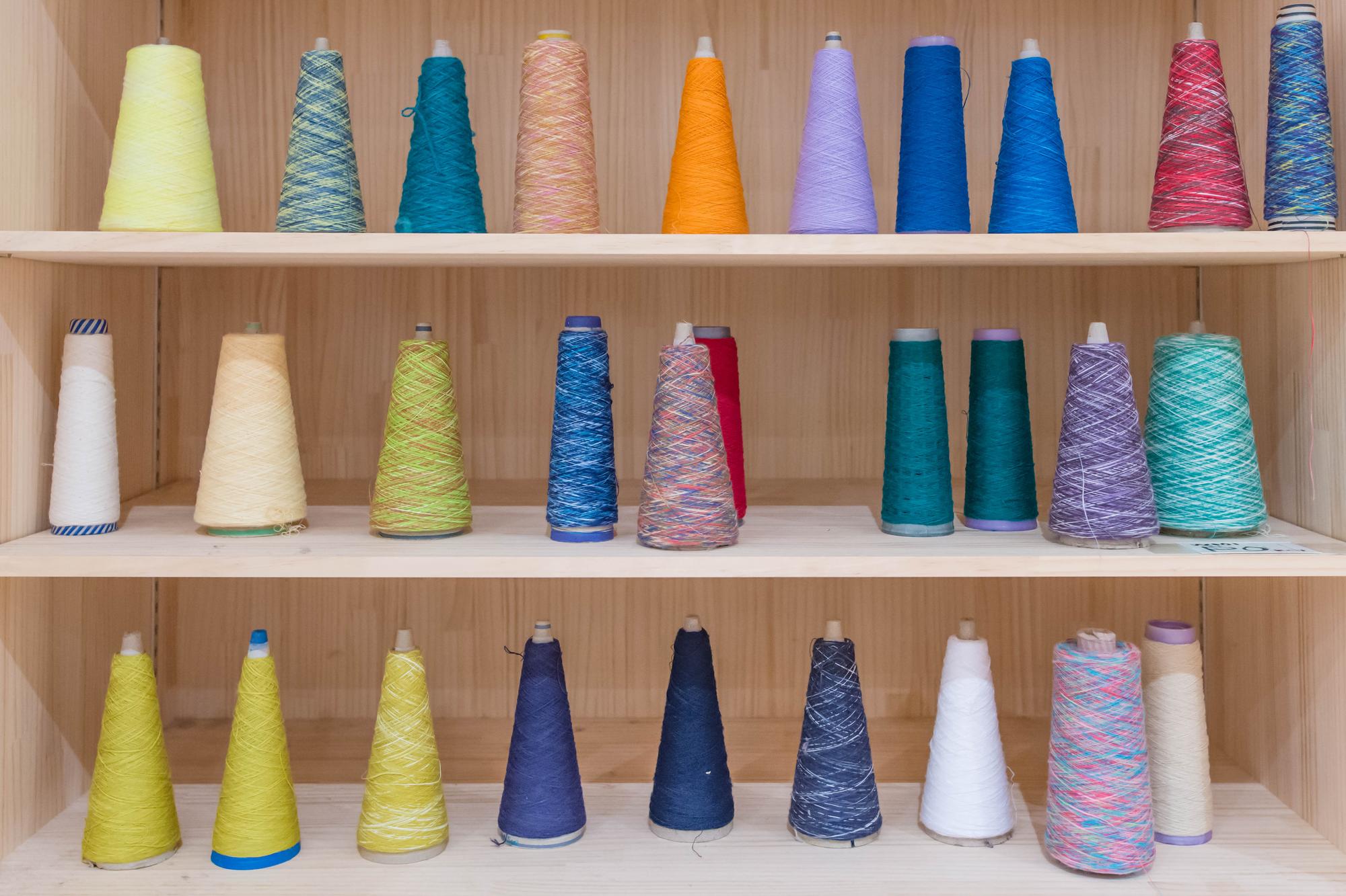Row of embroidered hats with different motifs